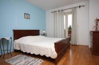 Postel nebo postele na pokoji v ubytování Apartments with a parking space Novalja, Pag - 3299