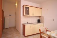 Kuchyň nebo kuchyňský kout v ubytování Apartments with a parking space Novalja, Pag - 3299