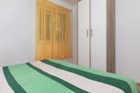 Posteľ alebo postele v izbe v ubytovaní Apartment Mimice 2805b