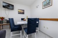 Televízia a/alebo spoločenská miestnosť v ubytovaní Apartment Mimice 2805b
