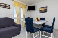 Televízia a/alebo spoločenská miestnosť v ubytovaní Apartment Mimice 2805b