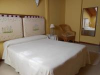Postel nebo postele na pokoji v ubytování Hostal Burgos