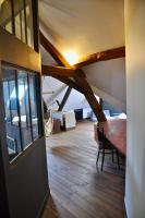 Łóżko lub łóżka w pokoju w obiekcie confortable maison familiale à l'entrée du village médiéval