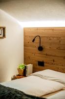 Posteľ alebo postele v izbe v ubytovaní Pradella Apartments