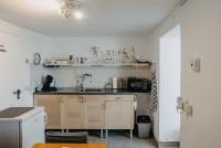 Kuchyň nebo kuchyňský kout v ubytování Apartment Familie Cortie