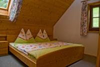 A bed or beds in a room at Lercherhof