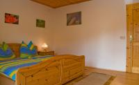 A bed or beds in a room at Lercherhof