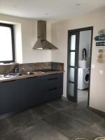Plan piętra w obiekcie Grange rénovée à neuf avec vue sur la baie
