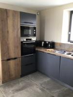 Plan piętra w obiekcie Grange rénovée à neuf avec vue sur la baie