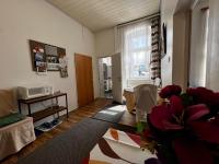 Televízia a/alebo spoločenská miestnosť v ubytovaní Abdalla Apartments