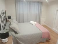 A bed or beds in a room at CASA PEREIRAS