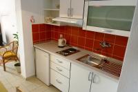 Kuchyň nebo kuchyňský kout v ubytování Apartments by the sea Igrane, Makarska - 5266