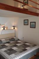 Postel nebo postele na pokoji v ubytování Apartments by the sea Igrane, Makarska - 5266