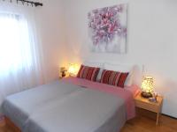 Posteľ alebo postele v izbe v ubytovaní Apartments with parking spaces Sveti Anton, Krk - 5288