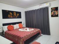 Postel nebo postele na pokoji v ubytování B&B NAMO PHUKET