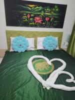 Postel nebo postele na pokoji v ubytování B&B NAMO PHUKET