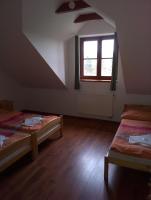 Postel nebo postele na pokoji v ubytování Penzion Pod Vyhlídkou