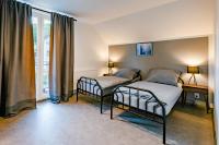 Postel nebo postele na pokoji v ubytování bergRESORT apartments