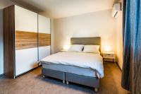 Postel nebo postele na pokoji v ubytování bergRESORT apartments