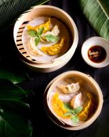 three bowls of food on a table at Hotel Bussi Baby in Bad Wiessee