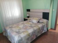 Posteľ alebo postele v izbe v ubytovaní Casa Carla