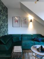 Posedenie v ubytovaní Zielony apartament z widokiem na jezioro