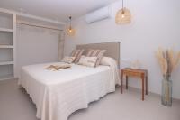 Posteľ alebo postele v izbe v ubytovaní Villa Eden Beachfront Corralejo By Holidays Home