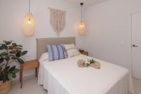 Posteľ alebo postele v izbe v ubytovaní Villa Eden Beachfront Corralejo By Holidays Home