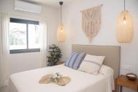 Posteľ alebo postele v izbe v ubytovaní Villa Eden Beachfront Corralejo By Holidays Home