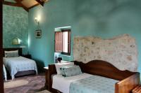 Łóżko lub łóżka w pokoju w obiekcie Room in Villa - Beautiful Accommodation At The Heart Of Andalusia