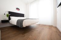 Posteľ alebo postele v izbe v ubytovaní Fiorentini Residence MILANO