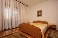 Posteľ alebo postele v izbe v ubytovaní Apartments by the sea Pag - 6383