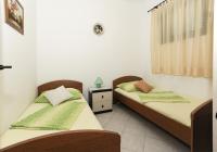 Posteľ alebo postele v izbe v ubytovaní Apartments by the sea Pag - 6383