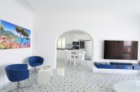 Televízia a/alebo spoločenská miestnosť v ubytovaní Villa sul mare - Praiano (Amalfi Coast)