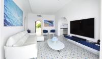 Televízia a/alebo spoločenská miestnosť v ubytovaní Villa sul mare - Praiano (Amalfi Coast)