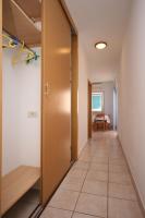 Postel nebo postele na pokoji v ubytování Apartment Stara Novalja 6301b