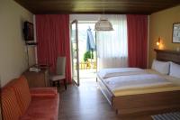 A bed or beds in a room at Sportpension Ramlhof
