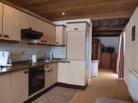 A kitchen or kitchenette at Sportpension Ramlhof