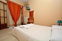 Postel nebo postele na pokoji v ubytování Nina Apartments