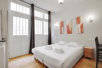Łóżko lub łóżka w pokoju w obiekcie Cozy studio - 2P - Gare de l'Est
