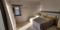 Posteľ alebo postele v izbe v ubytovaní Rosanna kite apartments by the sea & pool with sunset