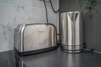 Kuchyňa alebo kuchynka v ubytovaní Capsule océan - Jacuzzi - Billard - Netflix - 2 Chambres - Cuisine