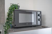 Kuchyňa alebo kuchynka v ubytovaní Capsule océan - Jacuzzi - Billard - Netflix - 2 Chambres - Cuisine