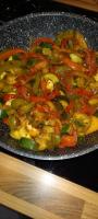 a pan of food with peppers and vegetables at Studio in Sorgues