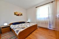Postel nebo postele na pokoji v ubytování Holiday Home Matan