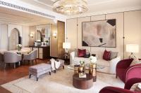 a living room with a couch and a table at Jumeirah Mina Al Salam Dubai in Dubai