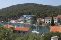 a town with a marina with boats in the water at Apartments with a parking space Bozava, Dugi otok - 8124 in Božava