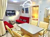 A television and/or entertainment centre at Camp Nou, Europa Fira - modern two-bedroom apartment with heating