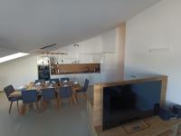 TV a/nebo společenská místnost v ubytování Penthouse Sunset