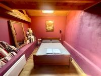 Posteľ alebo postele v izbe v ubytovaní Maison de campagne chaleureuse